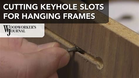 how to hang a picture with slots